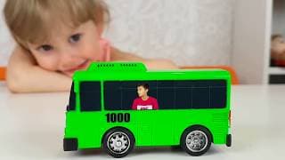 Alena and Pasha play with little Buses