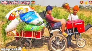 Homemade mini tractor pulling heavy loaded trolley with grass |DIY tractor |